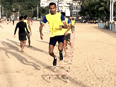 Agility hurdles drills at beach